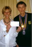 Gina Fielding of the West Yorkshire Forget-Me-Not Trust receives cheque from Jim Donnan President of The Rotary Club of Horbury and Ossett Phoenix